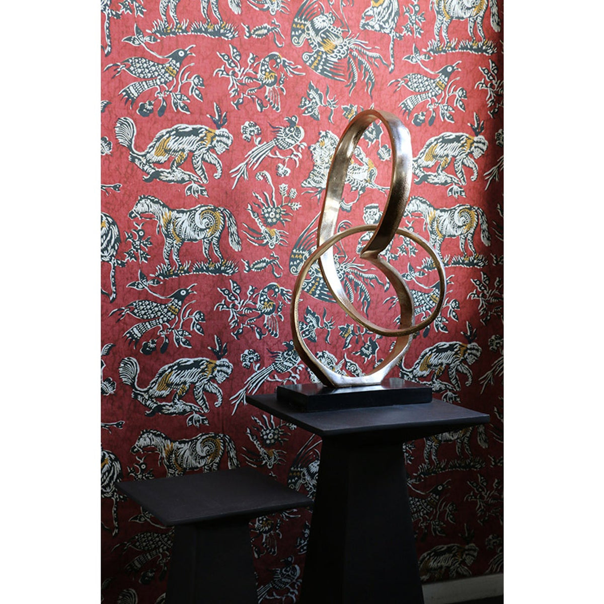 Infinity Sculpture in Antique Brass on Black Base