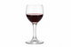 Wine glass filled with red wine on a white background