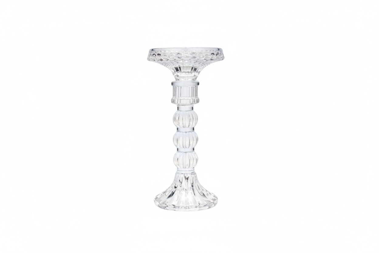 Clear glass candle holder on a white background