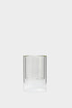 Clear glass tumbler on a white background