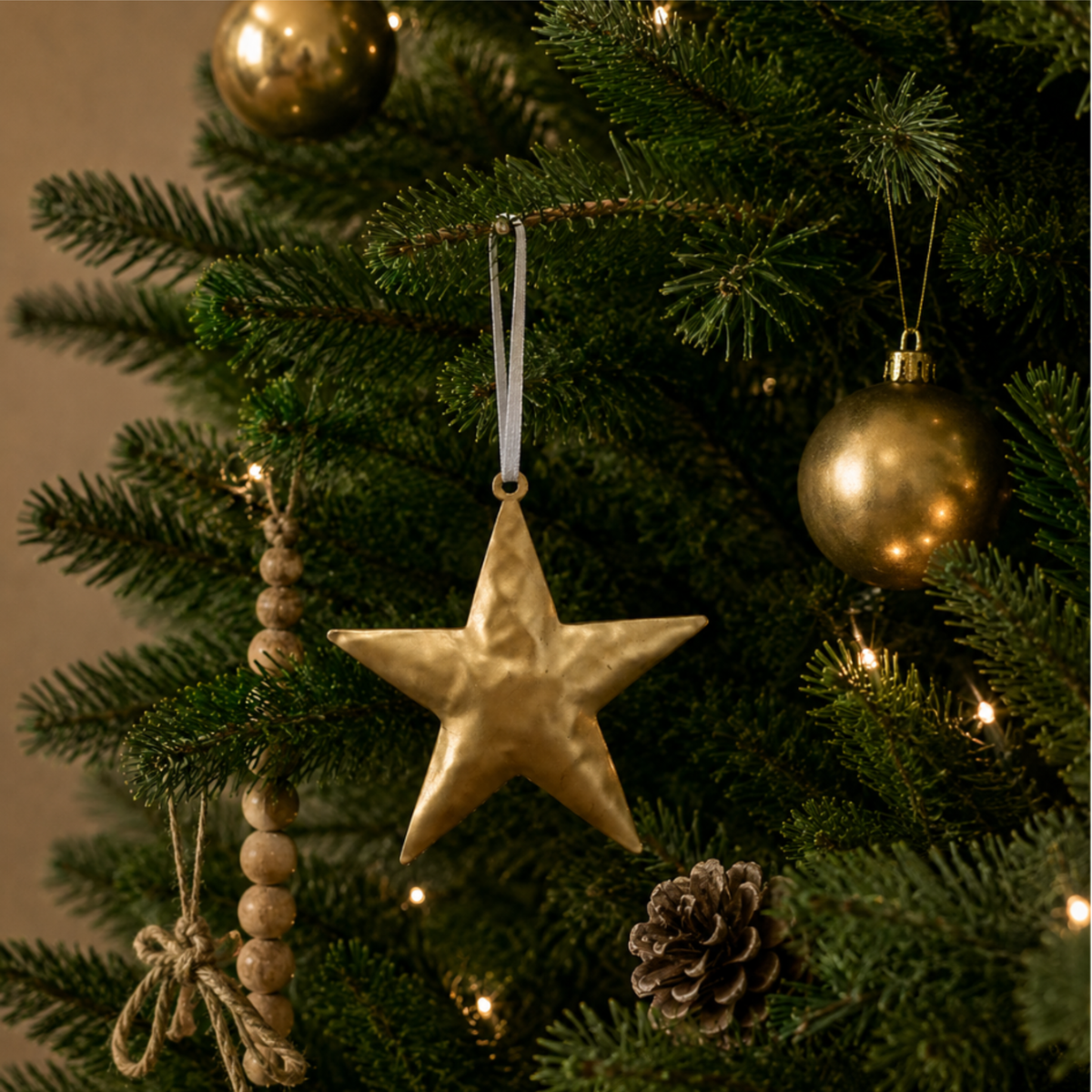 Bumpy Metal Star Christmas Decoration in Gold