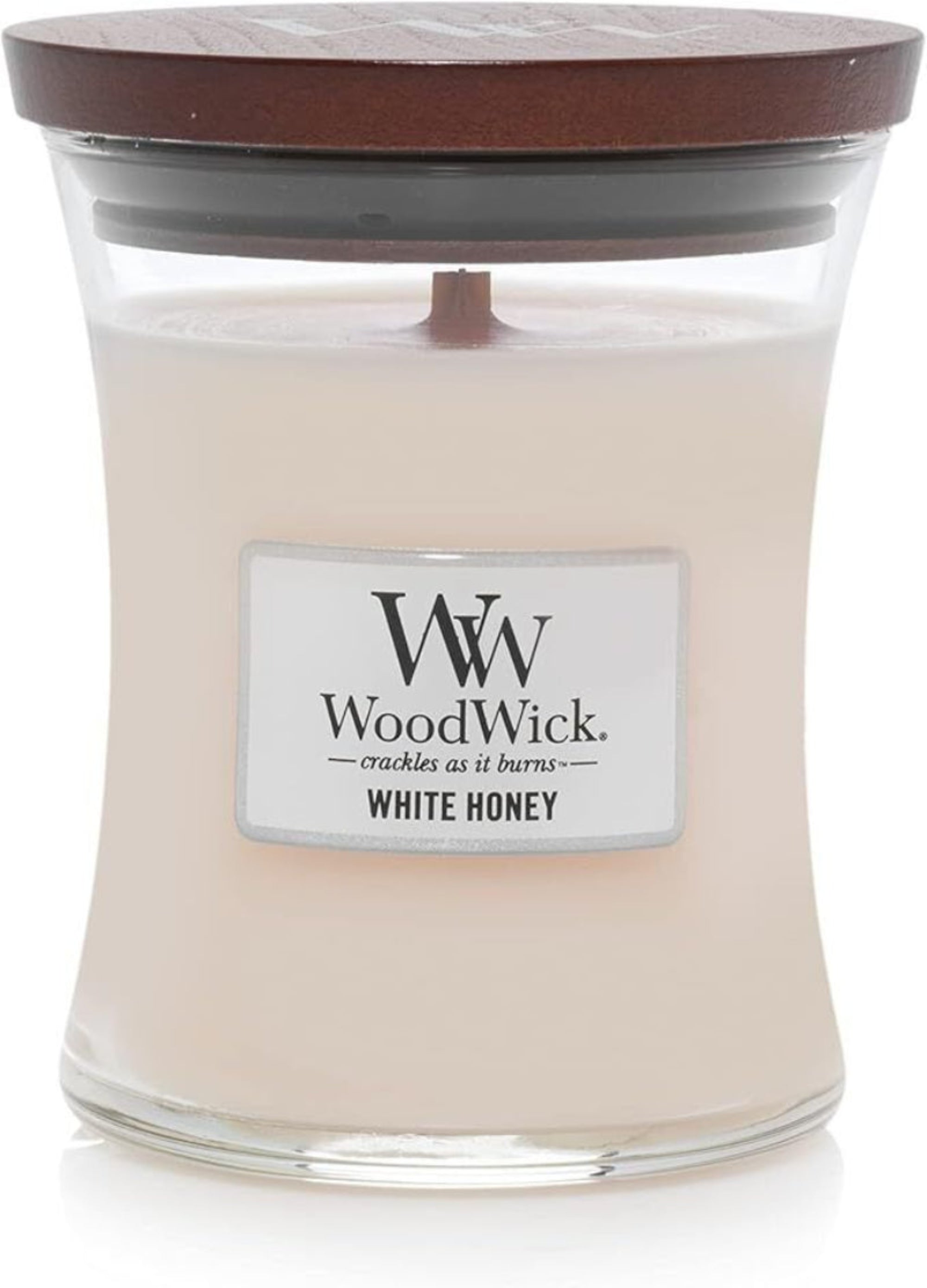 WoodWick White Honey candle with a wooden lid on a white background