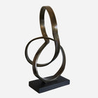 Infinity Sculpture in Antique Brass on Black Base