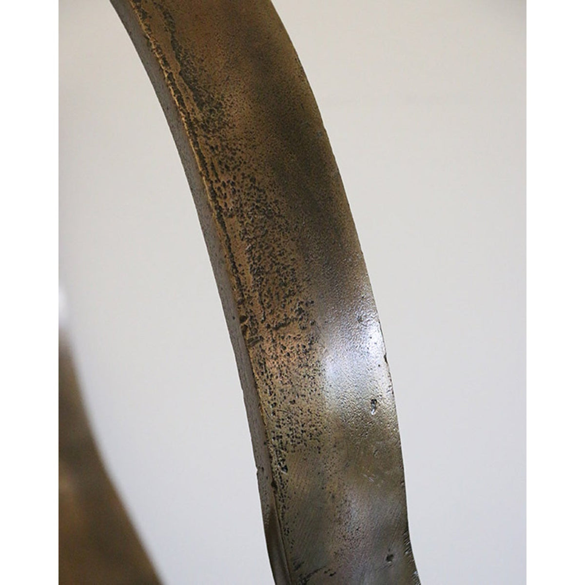 Infinity Sculpture in Antique Brass on Black Base