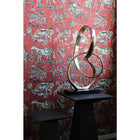 Infinity Sculpture in Antique Brass on Black Base
