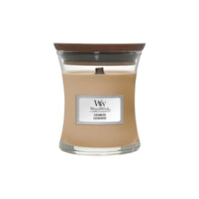 WoodWick candle with a label on a white background