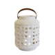 White textured lantern with a brown handle on a white background